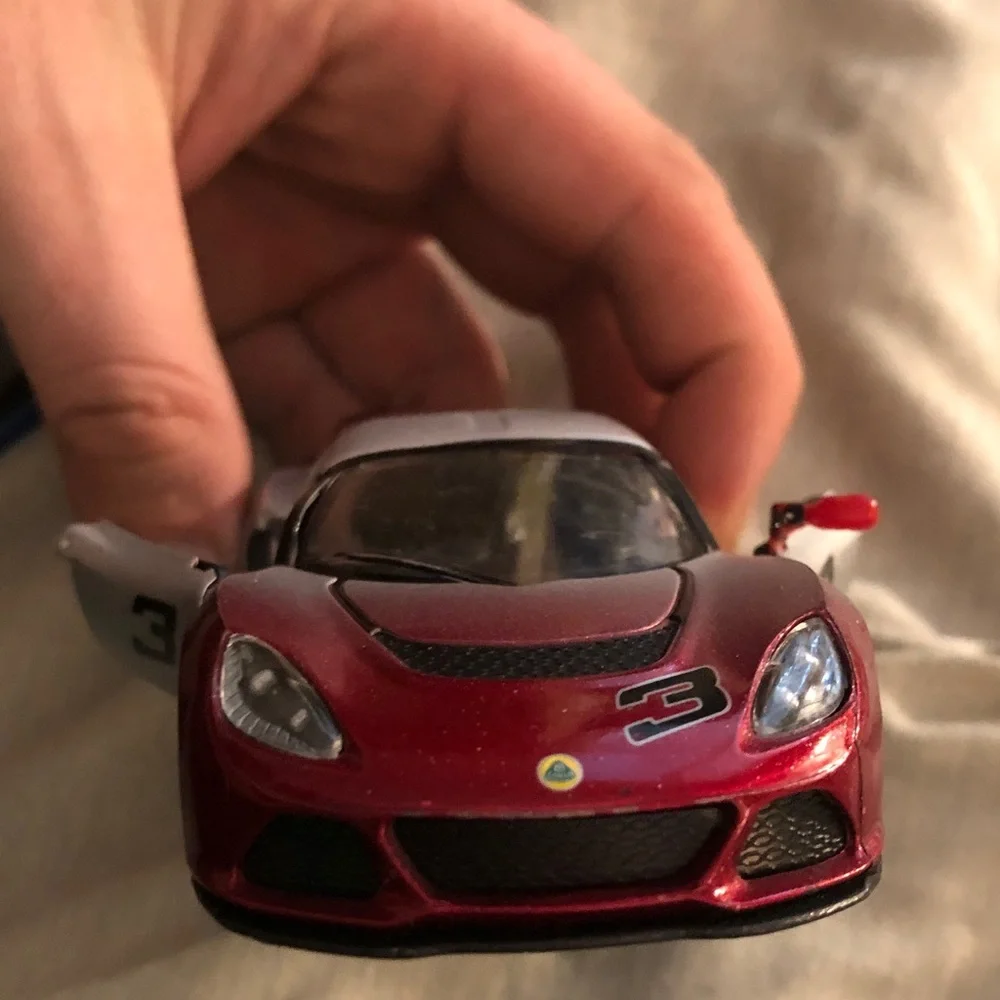 Red and Silver Lotus Exige S pull back action.